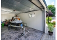 GARDEON® Garage mit Hörmann Garagentor, Fenster und Carport rechts