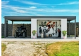 GARDEON® Gartenhaus mit sicherer Garagentür und Überdachung